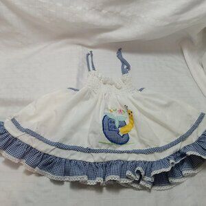 Pretty blue and white cotton jumper dress with embroidery with lace-up straps